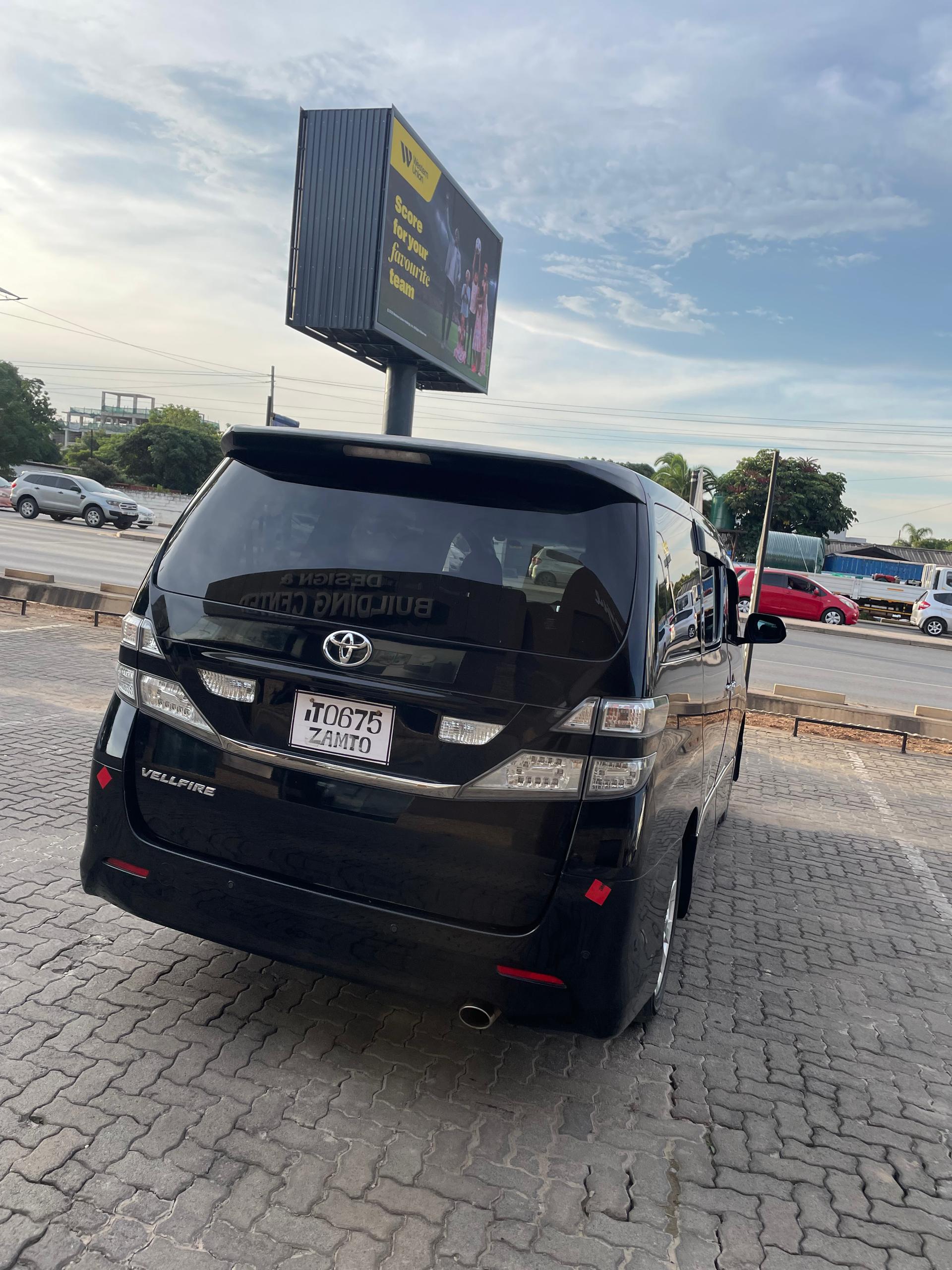 2010 TOYOTA VELLFIRE STATION WAGON Black - Rear View